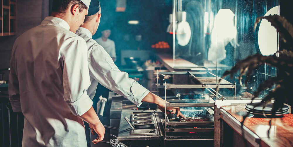 Restaurant kitchen with chefs